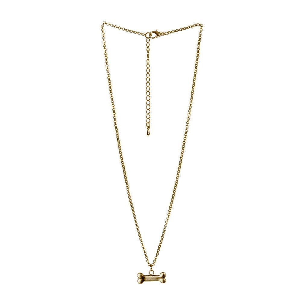 Brass tone bone pendant on long necklace