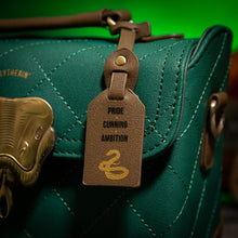 Load image into Gallery viewer, Branded Tag displaying &#39;Pride, Cunning, Ambition&#39; attached to Slytherin Trunk Bag