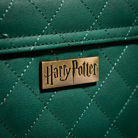 Harry Potter Metal Badge Detailing on the Quilted Material of the Slytherin Trunk Bag