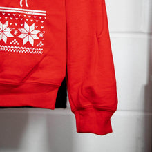 Load image into Gallery viewer, Sleeve and body of the Superman Christmas Jumper